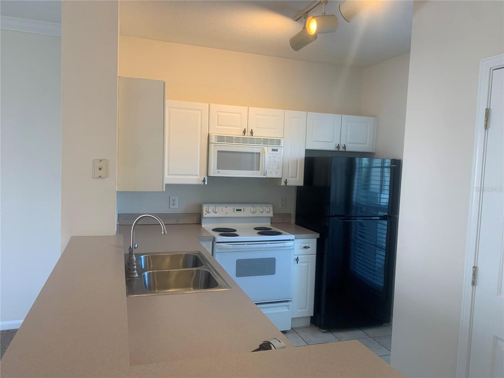Photo of 573 Water Street #573, Celebration, FL 34747 (MLS # S5154614)