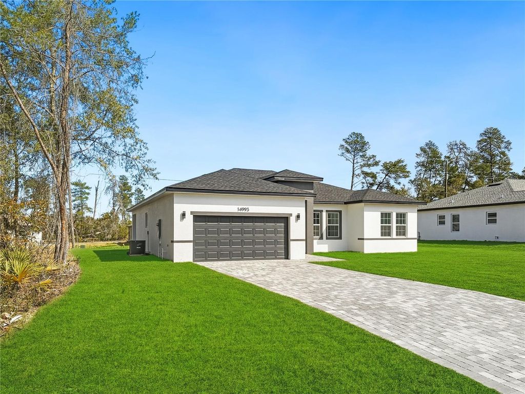Photo of 14993 SW 28th Terrace Road, Ocala, FL 34473 (MLS # O6377850)