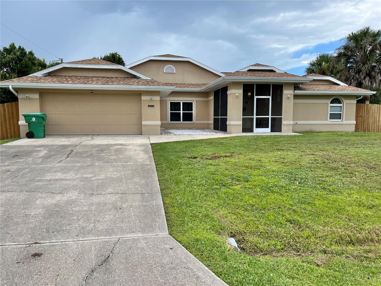 If you’re looking for the perfect property that has it all… large square footage, pool, land, THIS IS THE ONE! Welcome to 20159 Gladstone Ave. This home features 2552sqft of living space under air; and 3516 all together. Upon walking in, you will immediately notice the large screened in front entry way leading to the double front doors. Upon entering the foyer, you will notice the spacious open airy layout with a split floor plan. High cathedral ceilings, built in features, two separate living quarters, formal dining area, and plenty of storage space. The primary suite has two walk in closets, sliding door access to the pool, large primary bathroom with two separate vanity’s, soaking tub, and a large walk in shower. The kitchen overlooks the pool and has all the cabinet space you’ll ever need! Breakfast nook, eat in bar space, built in office section, with a new stove and dishwasher. Two guest bedrooms with plenty of hallway space in between. Large laundry room with sink and extra closet space. The pool deck has a covered entertainment area, pool half bathroom, storage closet, enclosed by the pool cage with a safety gate for additional safety. Fully fenced in yard on a half an acre of LAND, corner lot, with separate dog run! Water purification system connected to the property. Conveniently located near all the must have amenities. No HOA no deed restrictions and NO FLOOD ZONE. 2022 roof. Survey on hand saving you extra $. Scheduled your private tour today!