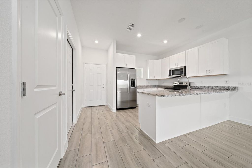 Photo of 462 Lake Shore Parkway, Davenport, FL 33896 (MLS # O6383790)