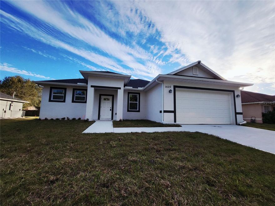 This beautifully finished home delivers a level of quality and style that exceeds expectations for newer construction. Shiny ceramic tile floors extend throughout the home, creating a bright, modern feel with clean architectural lines. The open floor plan allows the living, dining, and kitchen areas to flow effortlessly, ideal for both everyday living and entertaining.
The kitchen features solid surface countertops and a sleek, functional design, complemented by upgraded light fixtures and contemporary ceiling fans that add warmth and character. A flexible bonus room offers the perfect space for a home office, media room, guest area, or potential additional bedroom.
Sliding doors lead to a surprisingly spacious backyard—an increasingly rare feature as Palm Bay continues to grow. With no HOA, owners enjoy complete freedom without added fees or restrictions. Conveniently located near Malabar Road and I-95, the home offers quick access to shopping, dining, schools, medical facilities, and major employment centers. The beaches are just 15–20 minutes away, and proximity to the Space Coast’s expanding aerospace and technology corridor, including SpaceX, supports strong long-term value. This home is move-in ready and positioned for fast interest and a smooth closing.