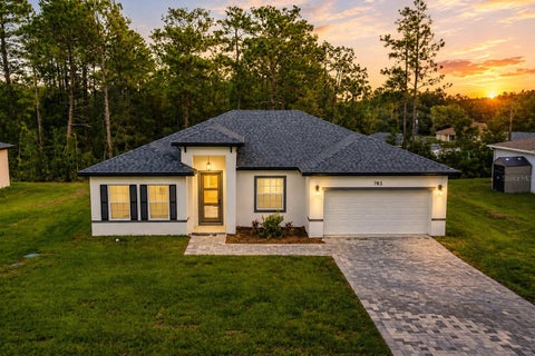 Photo of 783 Marion Oaks Trl, Ocala, FL 34473 (MLS # O6412425)