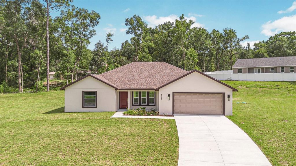 Photo of 54 Juniper Trail Loop, Ocala, FL 34480 (MLS # OM718715)