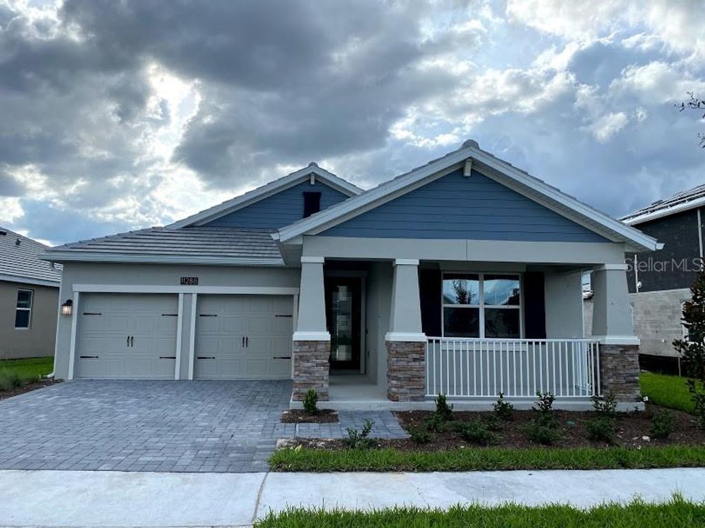 Photo of 11440 Satire St, Orlando, FL 32832 (MLS # R4910628)