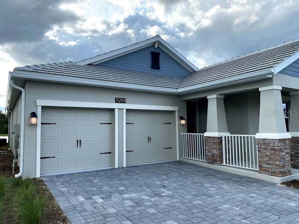 Photo of 11440 Satire St, Orlando, FL 32832 (MLS # R4910628)