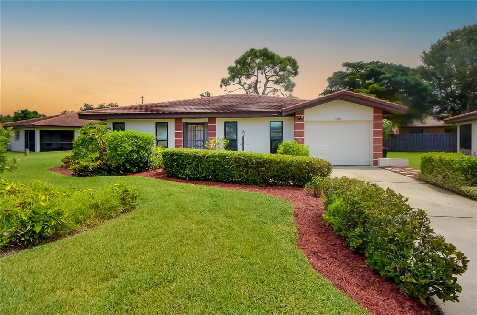 Situated in a distinguished condominium community, this refined residence at 3001 Vivienda Blvd, Bradenton, FL, combines the privacy of a standalone home with the benefits of condominium living. The property features a private garage and is part of a select enclave of detached homes within the complex, offering an ideal balance of seclusion and community engagement. With no age restrictions, this home welcomes residents of all generations, and pets are permitted within specified size guidelines. The master suite and guest bedroom are appointed with expansive walk-in closets, ensuring abundant storage. The master bathroom has been meticulously renovated to deliver contemporary elegance and functionality. The gourmet kitchen is equipped with premium stainless steel appliances, extensive cabinetry, and dual pantries, catering to culinary enthusiasts. An adjacent versatile space serves as an ideal office, breakfast nook, or additional dining area. Residents have access to a heated community pool, conveniently located steps away, fostering relaxation and social opportunities. Perfect for first-time buyers or seasonal residents, this home is strategically positioned near Bradenton’s pristine beaches, reputable schools, shopping, and cultural attractions, offering a lifestyle of sophistication and convenience.