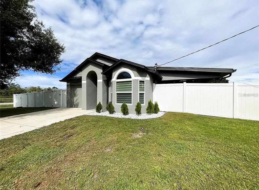 Photo of 18505 3rd Avenue, Orlando, FL 32820 (MLS # O6396525)