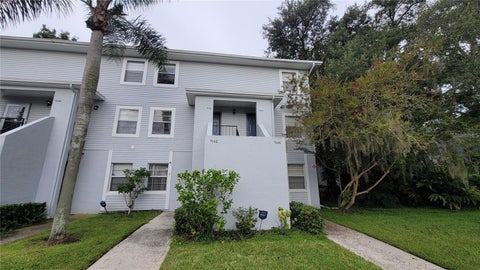 Photo of 7144 Waterside Drive, Tampa, FL 33617 (MLS # TB8545241)