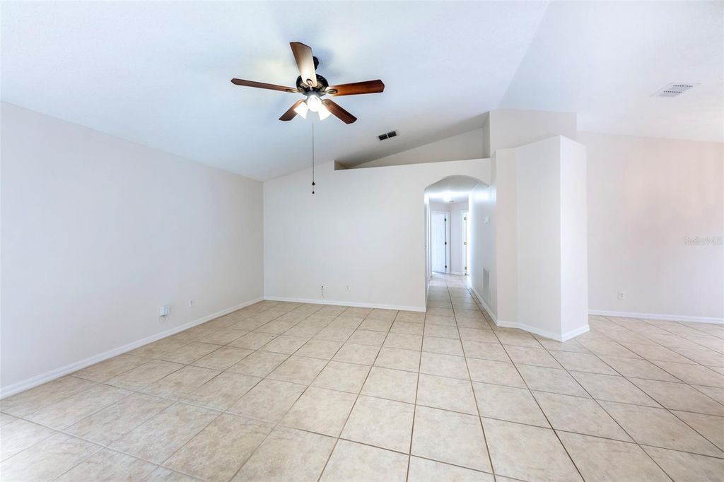 Photo of 10109 Vista Cove Lane, Orlando, FL 32825 (MLS # O6409464)
