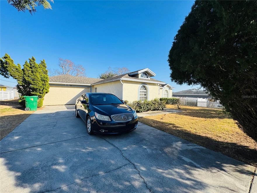 This well-maintained property offers a desirable split-bedroom floor plan and features a spacious kitchen with dining room combination, perfect for entertaining and everyday living. Enjoy peace of mind with major updates including a roof approximately 6 years old, water heater about 5 years old, and AC replaced approximately 3 years ago. The master suite includes dual sinks, a relaxing garden tub, and a separate stand-up shower. Step outside to a large fenced-in backyard and unwind on the screened-in covered lanai, ideal for enjoying Florida living year-round. Additional highlights include a long driveway, 2-car garage, and convenient location near Hwy 27 and Hwy 17, just outside downtown Dundee. Close to Dundee Elementary School, shopping, dining, and everyday conveniences. Nearby playground and walking trail add to the appeal. All measurements, room sizes and should be independently verified by buyer and/or buyer's agent.