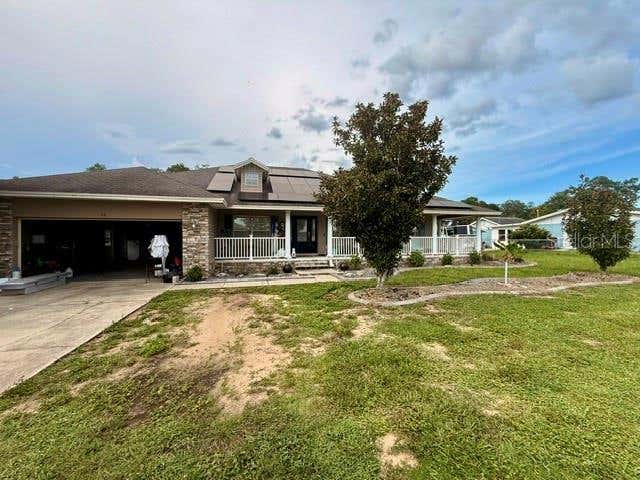 Photo of 12 E Lemon Street, Davenport, FL 33837 (MLS # P4939702)