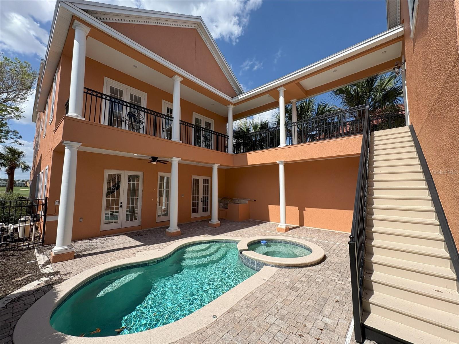 One of the very best lot locations and views within all of the Reunion Resort. Cul-de-sac location. New roof, new paint inside and outside, new carpeting, new painted garage walls and floor, new bulb lighting, newly repaired rear balcony Many features and upgrades.