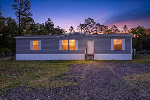 Photo of 2857 Hickory Street, Bunnell, FL 32110 (MLS # O6392037)