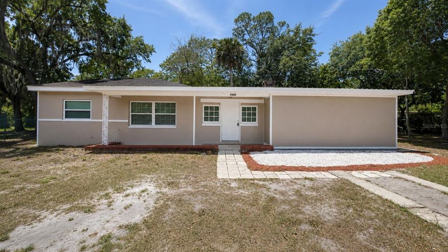 Spacious and inviting, this 5-bedroom, 2-bath pool home is located in established Sanford and offers a flexible layout designed for everyday living and entertaining. Inside, you’ll find multiple living areas, an updated kitchen with solid surface countertops and ample cabinetry, tile flooring in the main living areas, and a cozy brick fireplace that adds warmth and character to the home. The 5th bedroom is ideal for an office, working from home, hobbies, or additional guest space. Large windows provide natural light throughout, while the functional floor plan offers flexibility for growing households or multi-purpose living.
Step outside to your private screened pool area with plenty of room to create the perfect outdoor retreat for relaxing or entertaining year-round. The property also features a covered front entry, spacious yard, mature trees offering shade and privacy, extended driveway parking, and no HOA restrictions. Conveniently located near Historic Downtown Sanford, Lake Monroe, the Sanford RiverWalk, shopping, dining, major highways including I-4 and 417, and Orlando Sanford International Airport. Just a short drive to Central Florida beaches and attractions, this property combines comfort, convenience, and versatile living in one desirable Central Florida location.