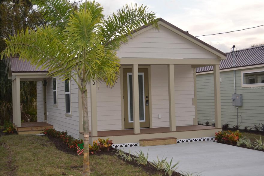 Janie Model 2 bedrooms and 1 bath  504 square feet with inside utility * currently there are 10 tiny house occupied in this location *  you can use the property as a first time homebuyer OR just downsizing * use as a short or long term rental or Airbnb * close to grocery stores in two directions * close to all schools and UCF College * Orlando International Airport about 30 minutes and same for all the parks * nice restaurants  and close to all the beaches . NO HOA FEES TO * Janie was our first 14' wide unit. It features all the amenities of all our models, with a wider footprint making the home much more spacious. These wider homes are more accommodating to king-size beds and larger furniture options. The Janie model also conforms to lots with a minimum square foot requirement of over 504 square feet..All appliances are included and the stackable washer and dryer also. Seller offering up to $10,000.00 incentive toward buyer rate buydown or closing costs.