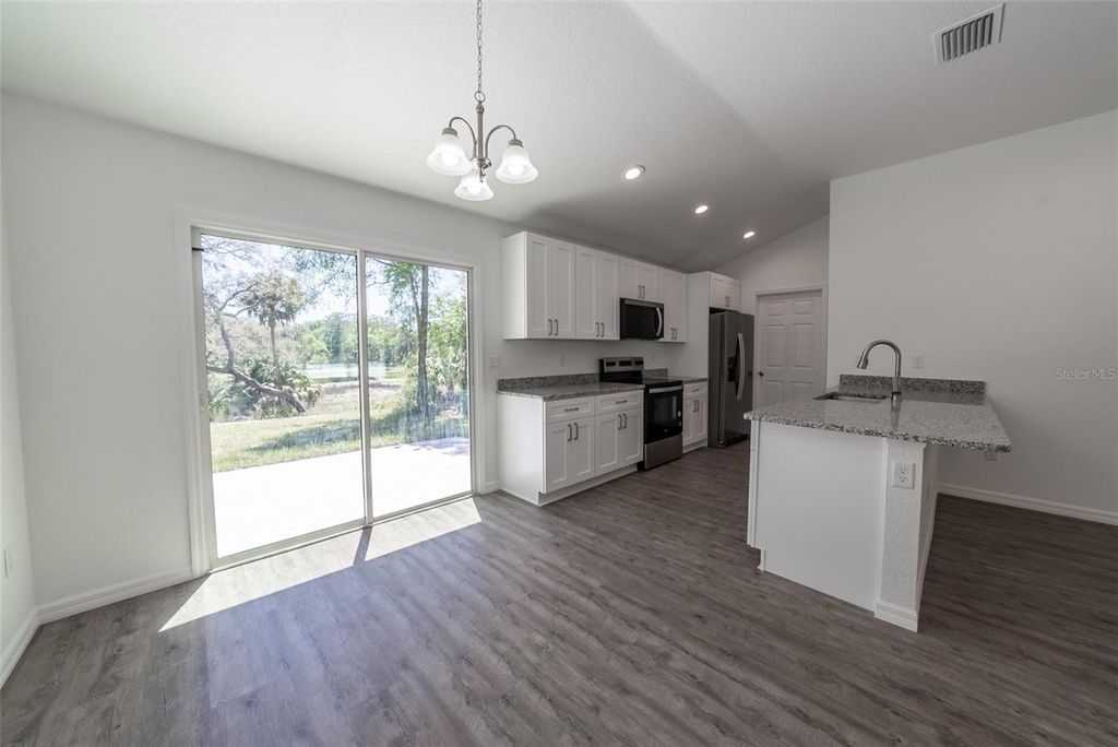 Photo of 16450 SE 57th Place, Ocklawaha, FL 32179 (MLS # OM693319)