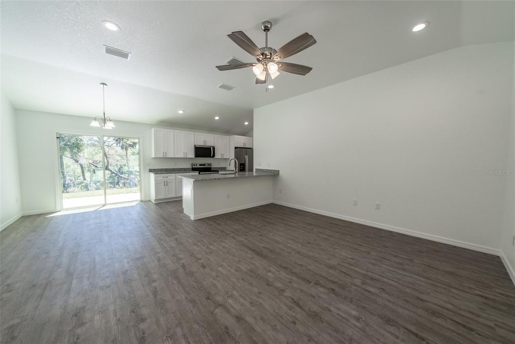 Photo of 16450 SE 57th Place, Ocklawaha, FL 32179 (MLS # OM693319)