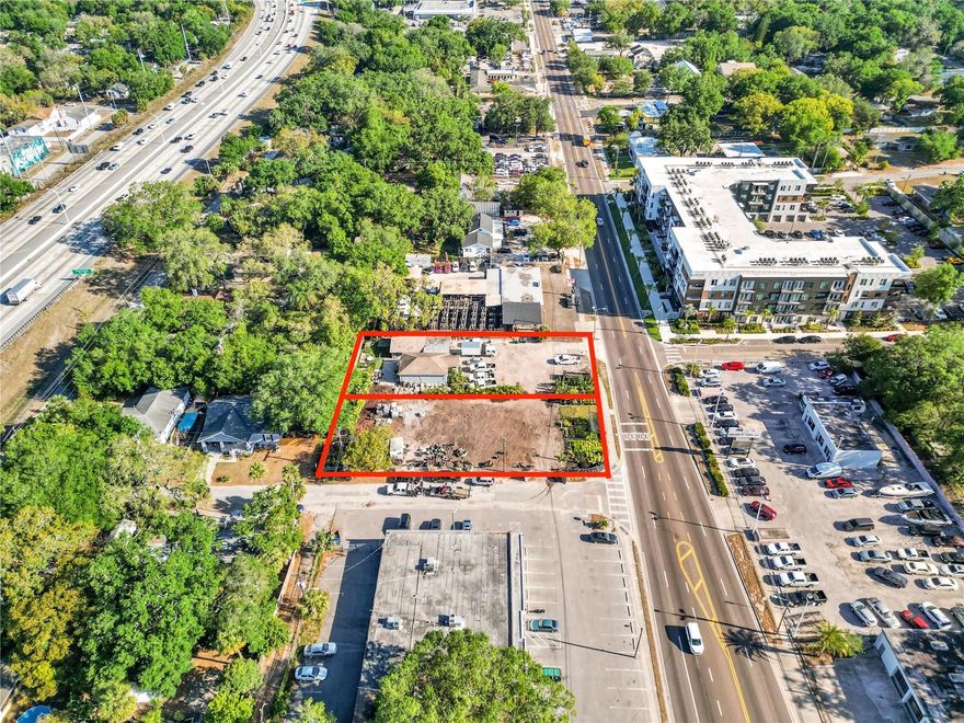 Welcome to the heart of Seminole Heights, where this .56 acre piece of land is waiting for you to transform it into something extraordinary. With a Future Land Use designation of CC-35, the possibilities are endless. The lot is 148x165 and is a corner lot with alley access, which makes it an ideal spot for a potential mixed-use or townhome development, with the potential to accommodate 6-8 townhomes with a rezoning. It's a double lot with one of them currently zoned Res and one currently zoned Commercial, both of which have a FLU of CC-35. The property's prime location and bustling neighborhood offer ample opportunities for commercial ventures as well. A restaurant or multiple commercial spaces could thrive in this spot, with the brand new apartment building right across the street providing a steady stream of potential customers. But that's not all – the property already includes a fantastic 1,100 square foot office building and another smaller building, offering even more potential for income-generating ventures in the interim of redevelopment. Don't miss your chance to invest in one of Tampa's most sought-after neighborhoods. This lot is a rare find and offers limitless possibilities for savvy investors and developers. Survey is attached!