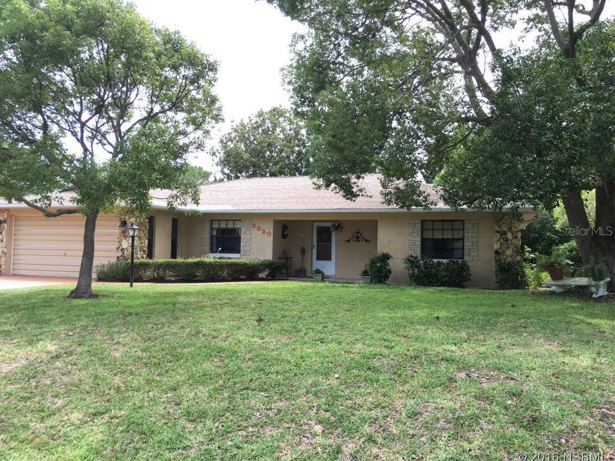 Come home to this very large 3/2 concrete block house on a high lot under mature shade trees. Freshly painted inside, kitchen updates 2015, 2nd bath updated 2015, new Bosch dishwasher 2016, parquet floors throughout and lots of special touches... not a cookie cutter style home. It is spacious and comfortable with a separate family room and living room to accommodate a large family. Eat in Kitchen and breakfast bar, split plan, two car garage and huge backyard. Air Conditioner installed 2009  and IT COULD BE YOURS!!!!!! ;Water: City