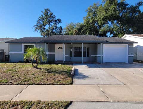 Photo of 11633 Fox Run, Port Richey, FL 34668 (MLS # W7887636)