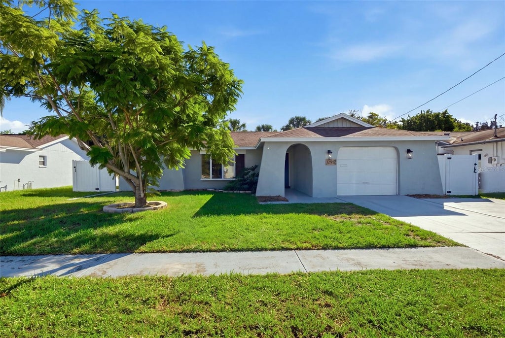 Photo of 12912 1st Isle, Hudson, FL 34667 (MLS # TB8553872)