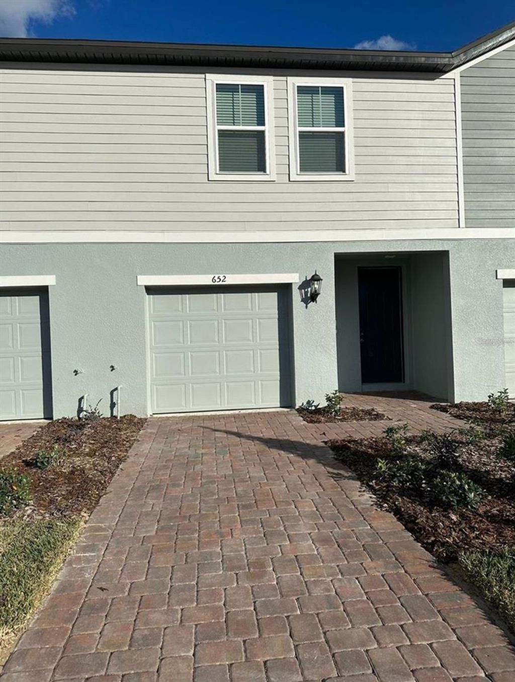 Photo of 652 Legacy Loop, Davenport, FL 33896 (MLS # O6406238)