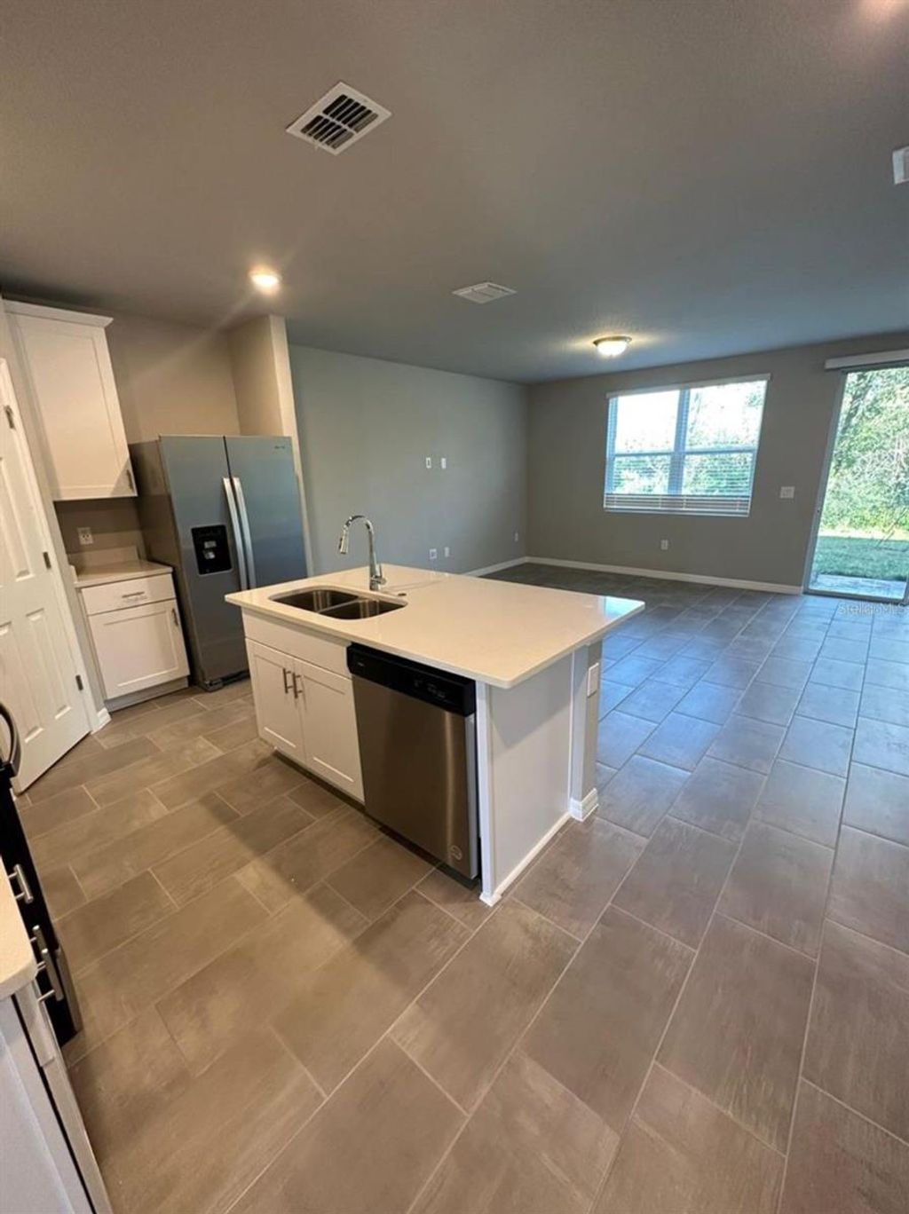 Photo of 652 Legacy Loop, Davenport, FL 33896 (MLS # O6406238)