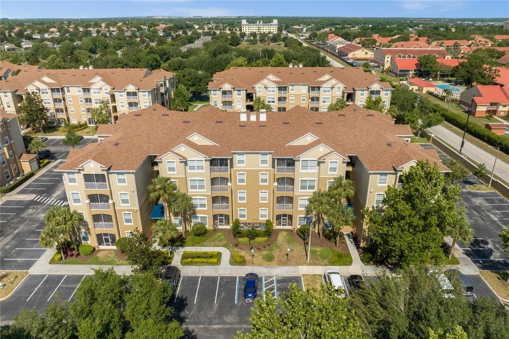 Photo of 2785 Almaton Loop #303, Kissimmee, FL 34747 (MLS # O6452728)