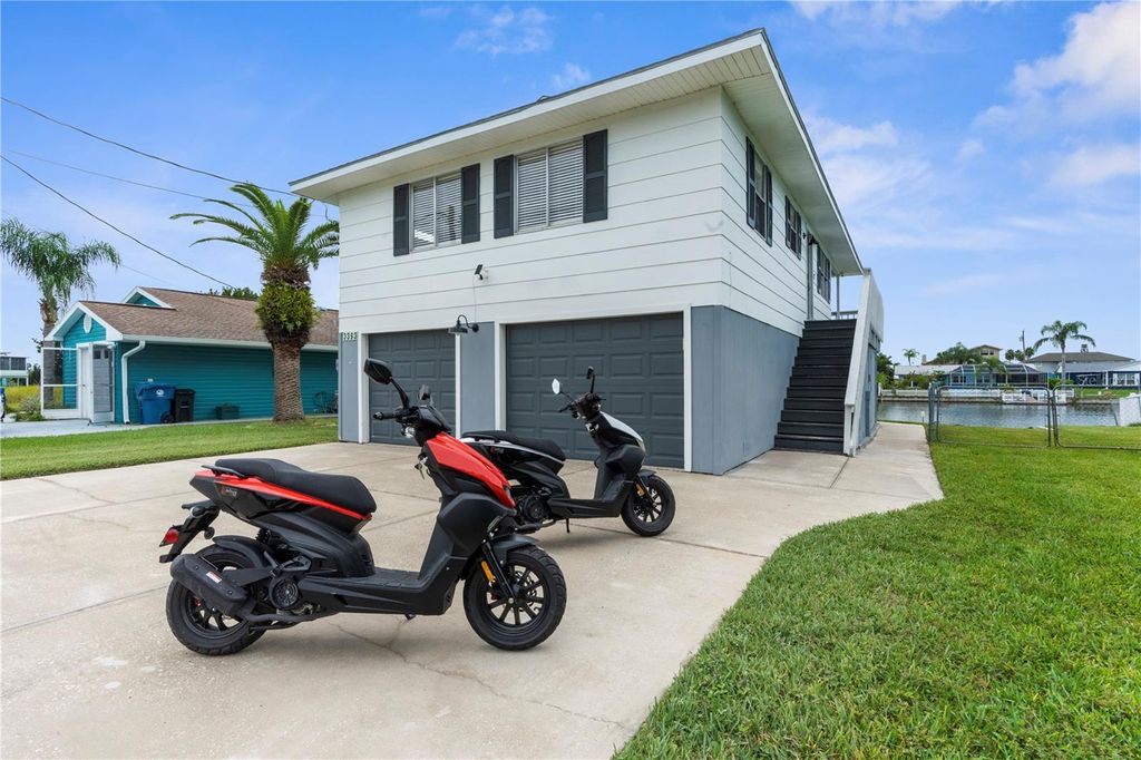 Photo of 3393 Poinsettia Drive, Hernando Beach, FL 34607 (MLS # TB8423439)