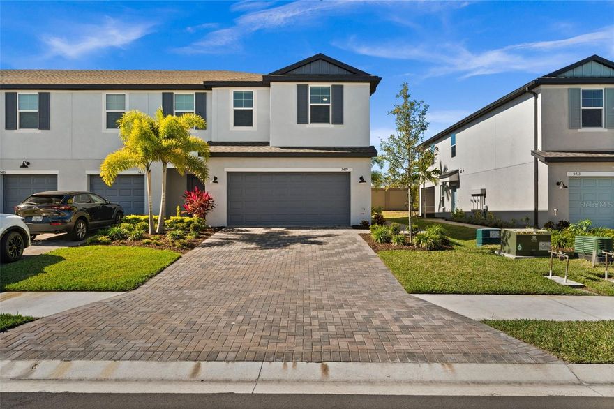 Experience contemporary Florida living in the sought-after Trevesta community. This beautifully designed Sable floor plan townhome by respected local builder M/I Homes offers quality craftsmanship and stylish finishes throughout. As an end unit, the home is filled with natural light and features an open, airy layout ideal for everyday living and entertaining. The main level showcases a well-appointed kitchen with quartz countertops, 40" cabinetry, a walk-in pantry, recessed lighting, and a stainless steel appliance package, seamlessly flowing into the spacious living and dining areas. Upstairs, you’ll find three bedrooms and two full bathrooms, including a relaxing owner’s suite with abundant natural light and a private en-suite bath designed for comfort and convenience. Step outside to your private patio—perfect for enjoying morning coffee or unwinding in the evening while embracing the Florida lifestyle. Impact glass throughout adds peace of mind and eliminates the need for hurricane shutters. Beyond the home, Trevesta offers resort-style amenities including a lagoon-style pool, clubhouse, fitness center, and additional community features that enhance everyday living. Conveniently located near I-75, with easy access to Sarasota and St. Petersburg, this home offers the perfect balance of luxury, comfort, and convenience. Don’t miss the opportunity to own a light-filled, well-crafted townhome in one of the area’s most desirable communities.