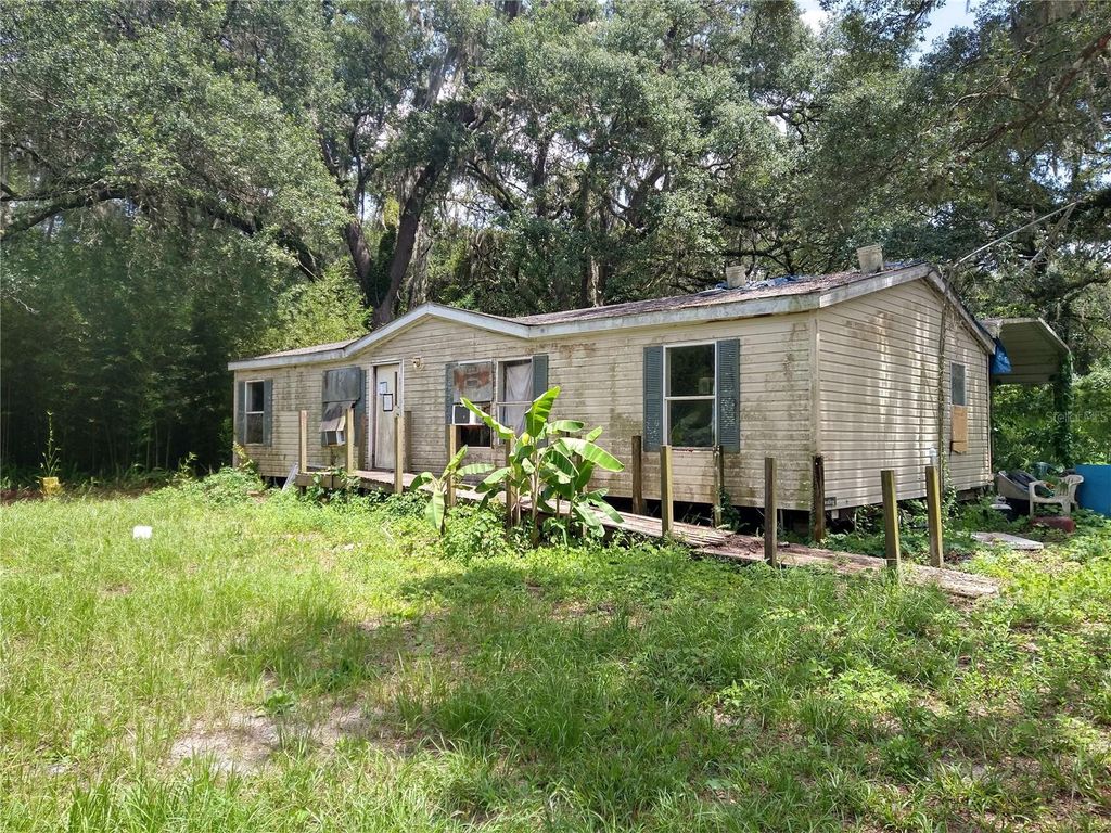Photo of 10616 Shady Drive, Hudson, FL 34669 (MLS # W7887937)