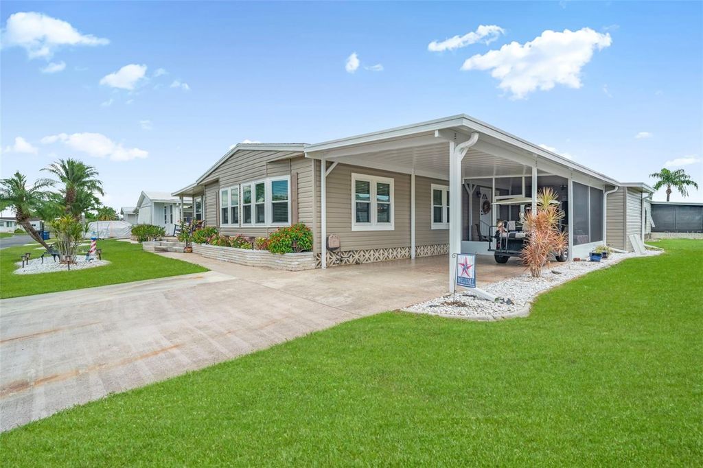 Photo of 408 Villa Nueva Circle, North Port, FL 34287 (MLS # TB8430121)