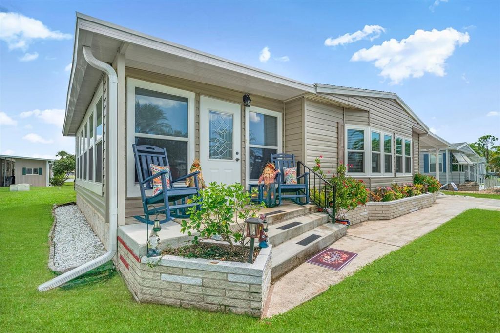 Photo of 408 Villa Nueva Circle, North Port, FL 34287 (MLS # TB8430121)