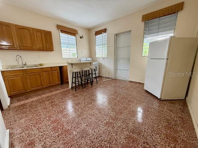 A cozy apartment is available for rent at the back of the property’s first floor, conveniently located near the Las Lomas Urban Train, the Metropolitan Hospital, the Interamerican University of Cupey, among others. The unit features one bedroom, one bathroom, and an open-concept living room/kitchen/dining area. Rent includes water and electricity, and also comes with a refrigerator, stove, water heater, and a spacious patio ideal for outdoor enjoyment. An excellent opportunity for those seeking a well-located place.