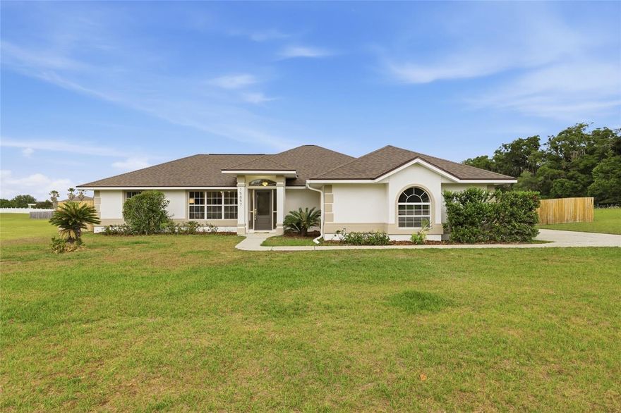 Completely renovated 3BR/2BA home on 1.01 acres at the end of a quiet cul-de-sac in desirable Tillman Acres, High Springs. This 1,938 sq ft single-family residence has been fully updated in 2026 — brand new roof, brand new HVAC, fresh interior and exterior paint, new flooring throughout, and a beautifully updated kitchen featuring quartz countertops. Both bathrooms have also been refreshed. Septic system inspection passed; well inspection passed — move-in ready with confidence. Enjoy the privacy of over an acre of land with a wood-fenced backyard, perfect for pets, outdoor entertaining, or simply enjoying the natural surroundings. The cul-de-sac location offers minimal traffic and exceptional seclusion. Vaulted ceilings, an open floor plan, and a screened lanai add to the appeal. Attached 2-car garage.