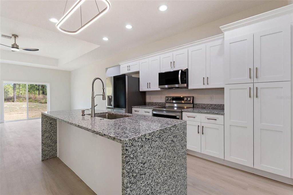 Photo of 3970 Laguna Drive, Indian Lake Estates, FL 33855 (MLS # P4938052)