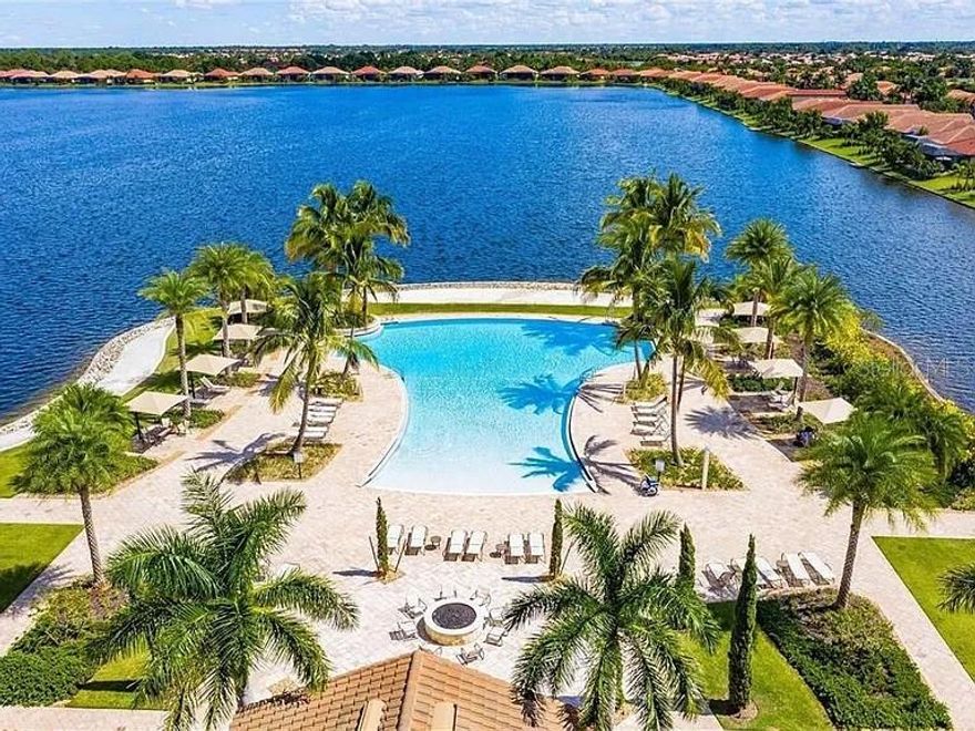 Amazing resort-style amenities are just one reason to love this light-filled home with breathtaking LAKE VIEW in Toscana Isles which offers an open, flowing layout, and quality finishes—available now for an annual rental. With FULLY FURNISHED 3-BEDROOM or 2-bedroom-plus-DEN home,the space is both functional and inviting. The main living area welcomes you with natural light and connects seamlessly to the dining area and kitchen. Quartz countertops, wood cabinetry, stainless steel appliances, and a center island designed for seating or meal prep make the kitchen as practical as it is stylish. The primary suite is tucked away at the rear of the home and features a walk-in closet and a private en-suite bath with dual sinks. The second bedroom is located near the front of the home, adjacent to the second full bathroom. A versatile den offers space for working from home, hobbies, or occasional guests. Enjoy peaceful outdoor living from your COVERED LANAI, accessed by sliding doors from the rear of the home, with a lake view.
Toscana Isles is a gated community offering an infinity-edge pool with lake views, tennis and pickle ball courts, a fully equipped fitness center with specialty workout rooms, a dog park, playground, and a clubhouse with regular events and social spaces. Residents also enjoy kayaking, canoeing, and fishing on over 60 acres of lakes. The community activity director keeps the calendar full of events and social opportunities.This home is the perfect retreat with access to beaches, shopping, dining, and I-75 the community lakes. Lawn care is included, and the location provides quick access to I-75, beaches, shopping, and dining. Between Venice and Nokomis and a quick drive to Sarasota or Wellen Park, the location is more than ideal. It is perfect! Easy to show. Minimum 6 month lease, but preferable 12 month + (excludes water and electricity).The Small Dog is acceptable with the pet fee. Here is your chance to live in paradise...You will absolutely love living here! Available from December 1,2025 or SOONER. Please ask the Agent!