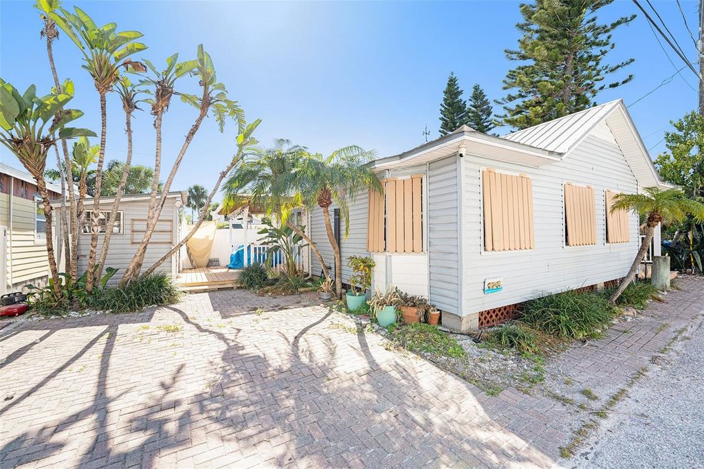 Photo of 125 95th Avenue, Treasure Island, FL 33706 (MLS # TB8450480)