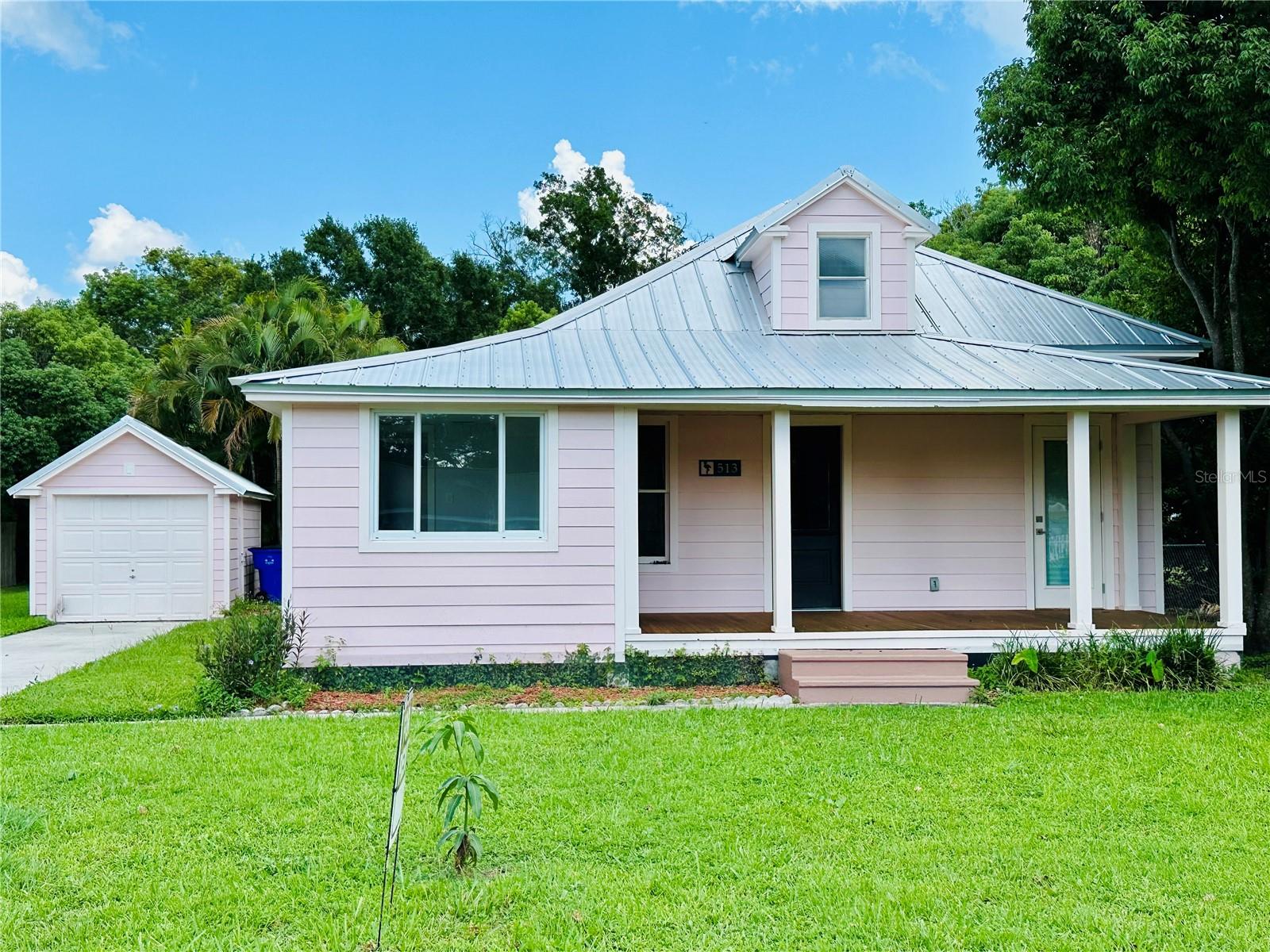 This charming 4-bedroom, 2-bathroom home blends vintage character with today’s comfort. Step inside and enjoy spacious living areas filled with warmth and personality. Outside, you’ll be amazed by the incredible oversized backyard, perfect for family fun, entertaining, or simply relaxing under the Florida sun. The property also includes a detached garage, offering storage or workspace options. Conveniently located near shopping, dining, and all that St. Cloud has to offer, this home is truly one of a kind. With its timeless style and unbeatable location, it’s the perfect place to call home!