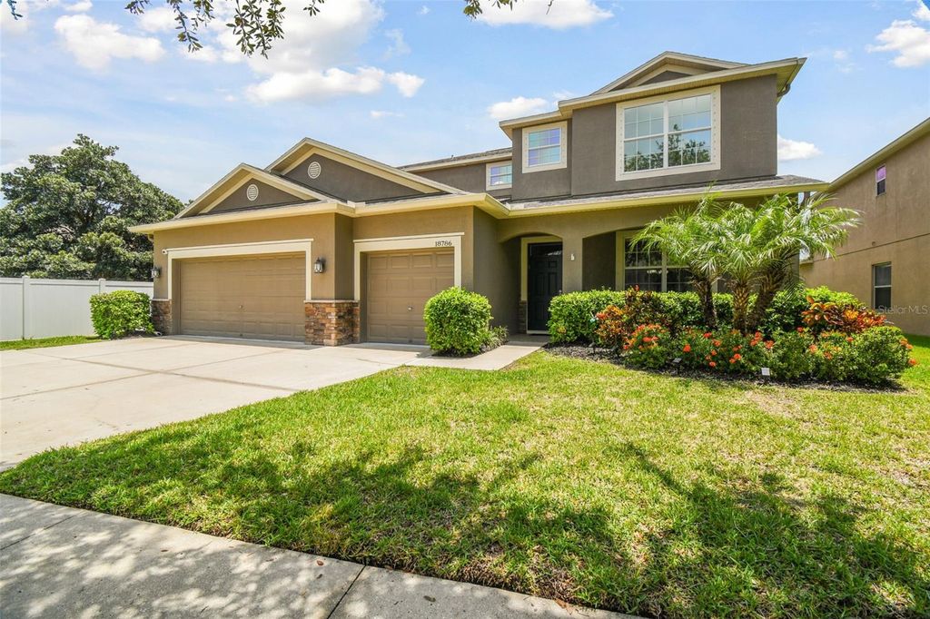 Photo of 18786 Milton Keynes Court, Land O Lakes, FL 34638 (MLS # U8249068)