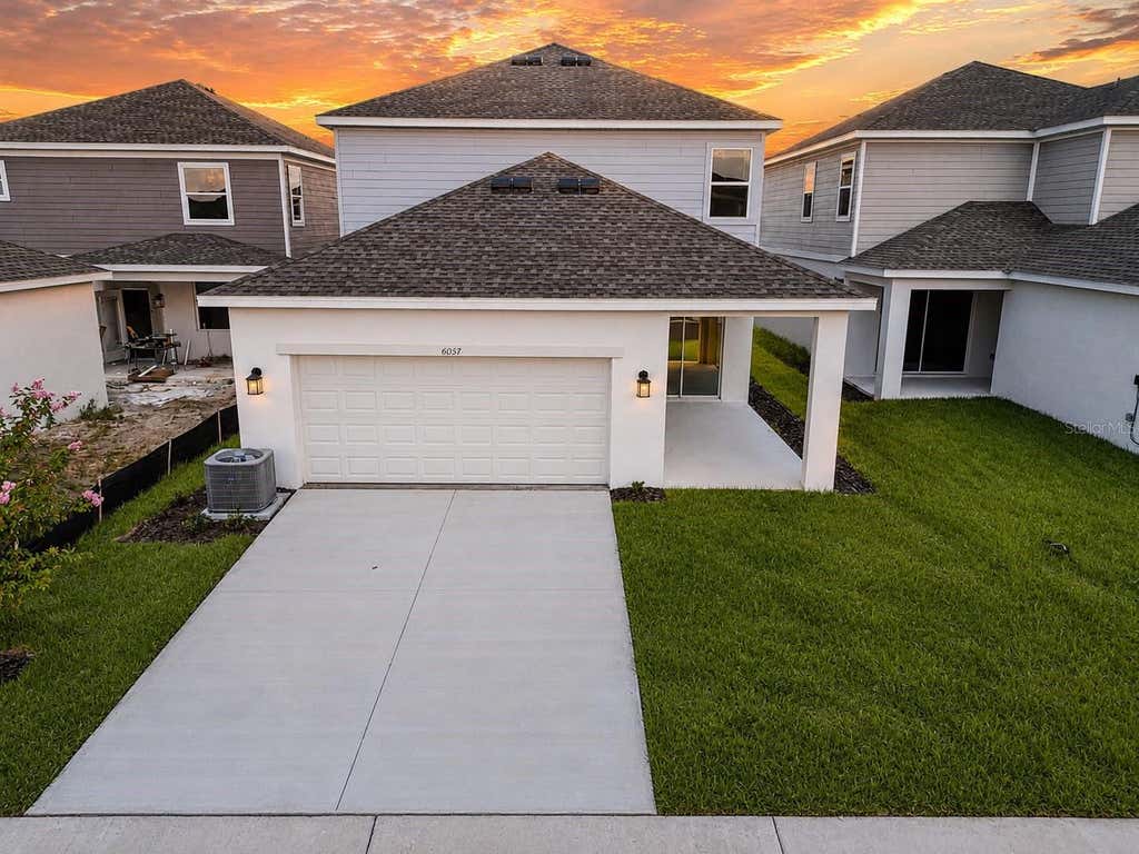 Photo of 6057 Meditation Dr, Clermont, FL 34714 (MLS # S5152398)
