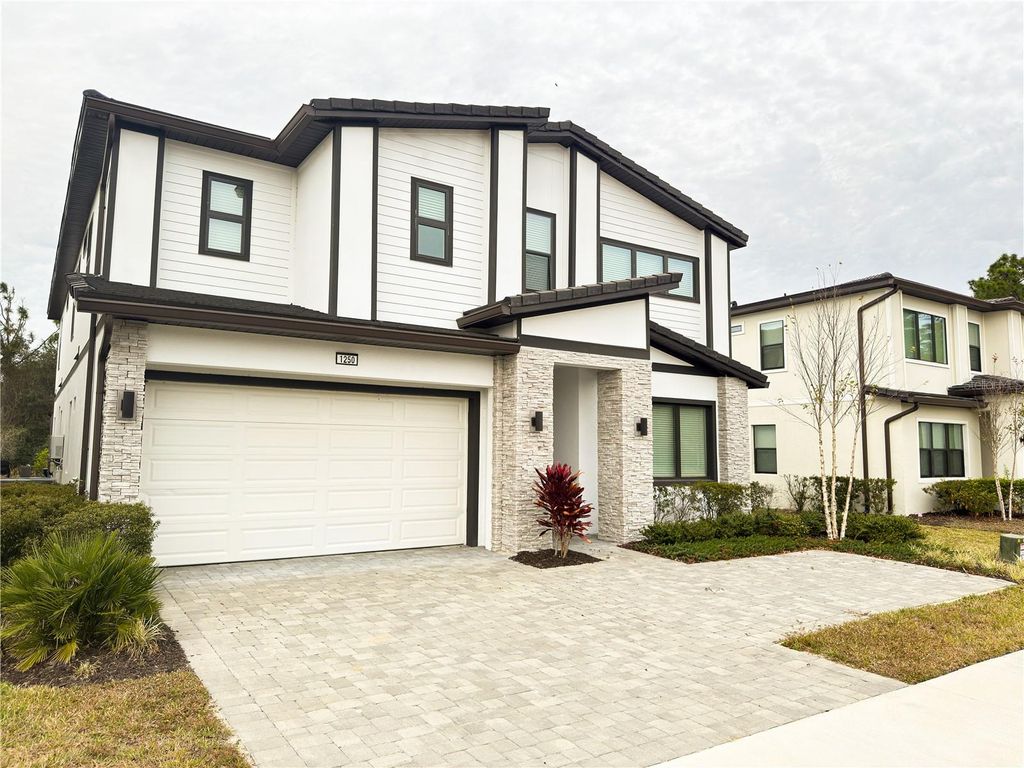 Photo of 1250 Butterfly Orchid Rd, Davenport, FL 33837 (MLS # S5142096)