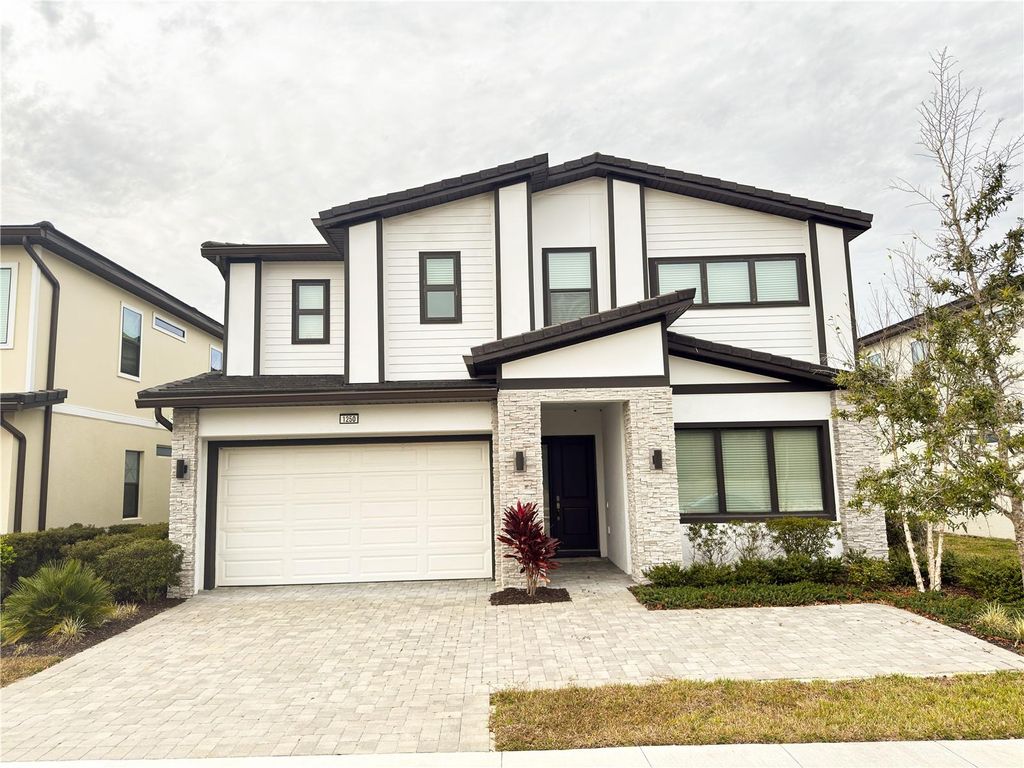 Photo of 1250 Butterfly Orchid Rd, Davenport, FL 33837 (MLS # S5142096)