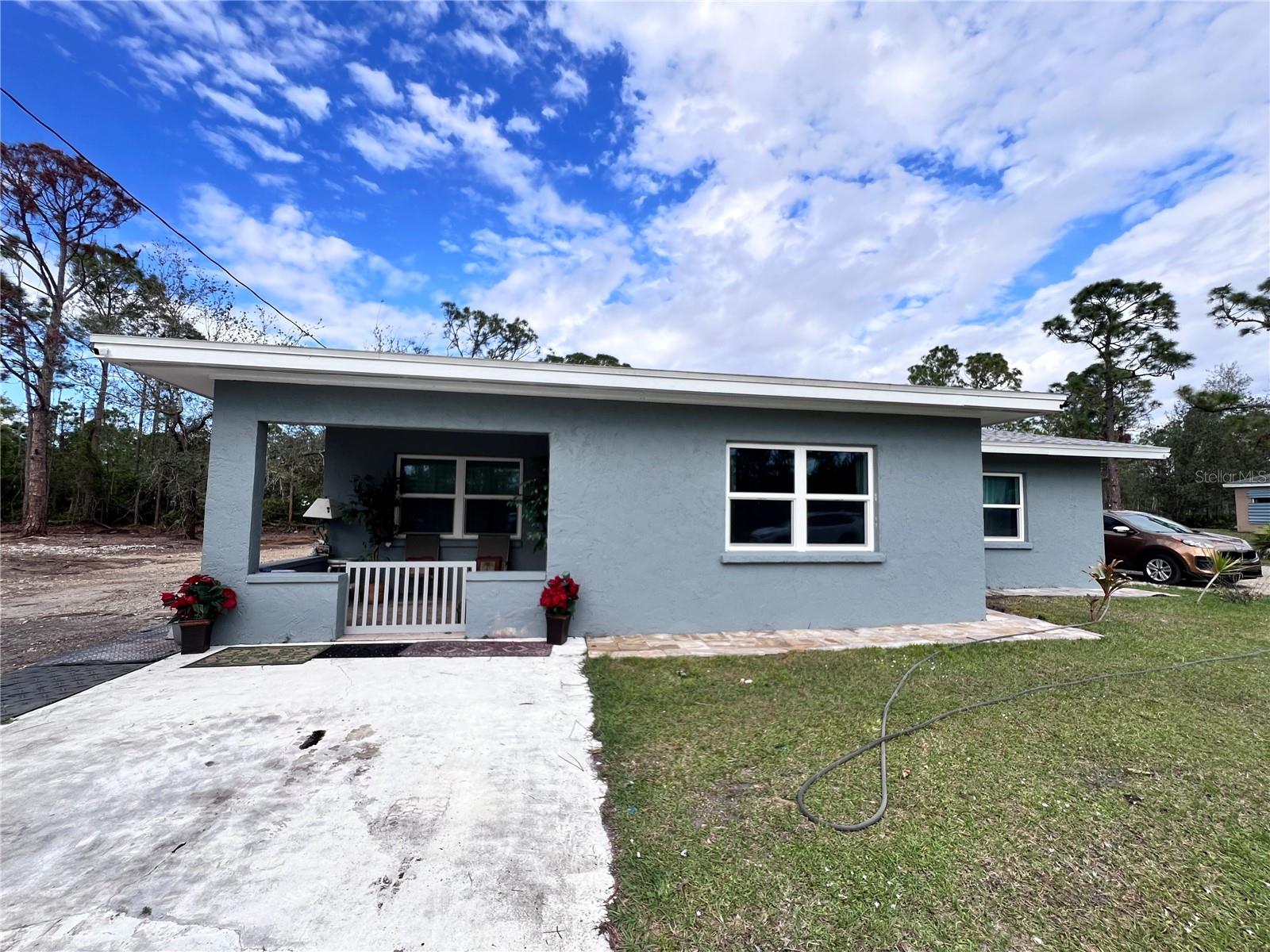PRICE ADJUSTMENT OPPORTUNITY ALERT TRIPLE LOT! A fantastic investment opportunity or the perfect permanent residence awaits! This beautifully remodeled 2-bedroom, with potential for a thirst and 1-bath home in peaceful Tropical Gulf Acres offers exceptional privacy and modern charm. Recent upgrades include a newer roof for worry-free living. Located on a quiet street with easy access to US-41, I-75, and Punta Gorda Airport, this home is perfectly situated. Nearby, enjoy golf courses, downtown Punta Gorda’s historic charm, restaurants, shopping, beautiful parks, award-winning fishing and boating, and community events. Plus, Fort Myers is just a short drive away.