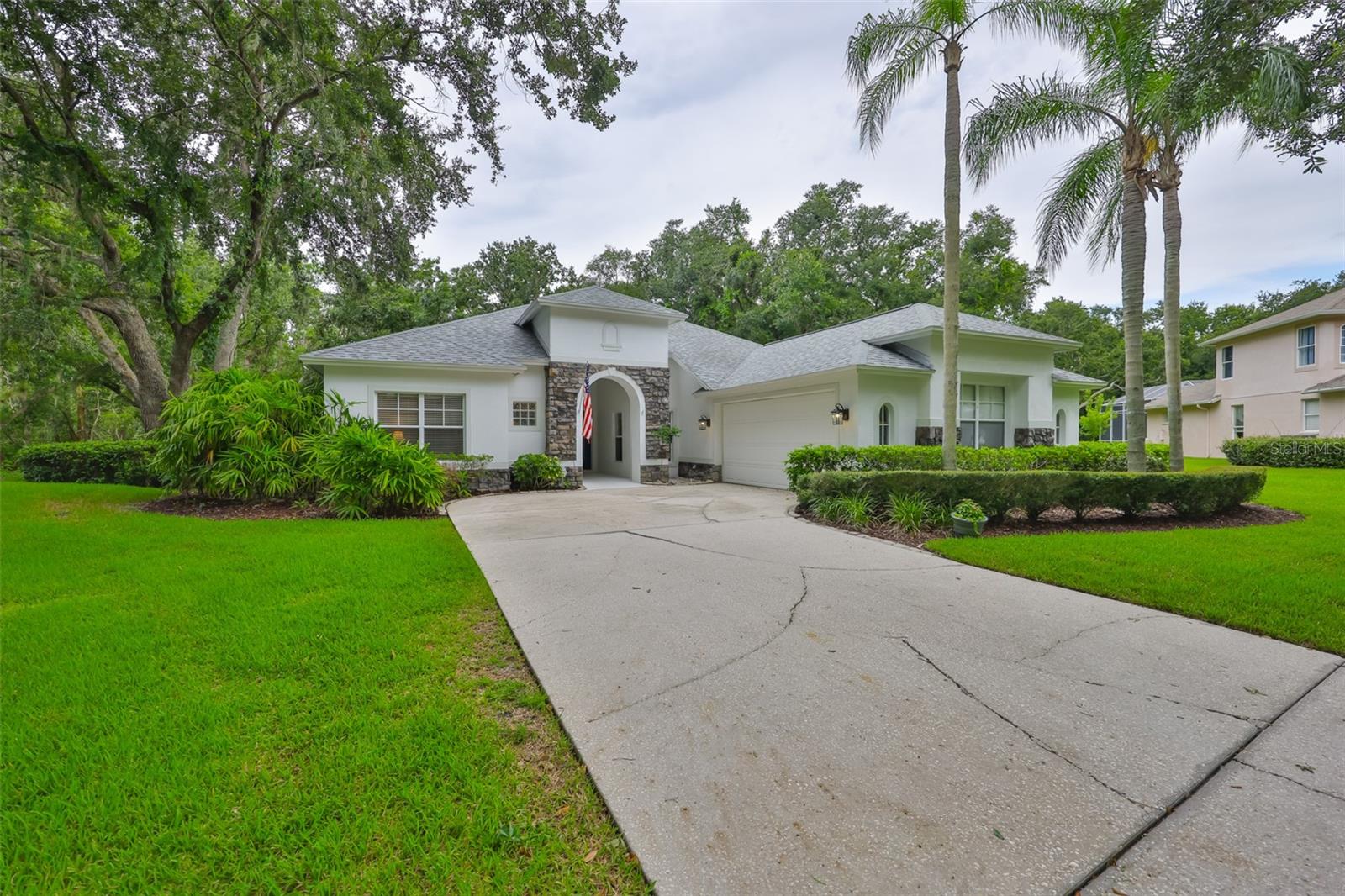 Welcome to this stunning 5-bedroom, 3.5-bath pool home located in the highly sought-after River Hills
Country Club! Situated on a private half-acre lot is perfectly situated backing up to a peaceful conservation
area with a system of walking trails, offering direct access to nature filled adventures right from your
doorstep. This home offers the perfect blend of luxury, space, and tranquility. Step inside through elegant
double doors to find brand-new luxury vinyl flooring throughout. The spacious living and dining areas feature
oversized sliding glass doors that open to a screened-in pool and spa, with the scenic conservation views
providing a beautiful, private backdrop. This thoughtfully designed split floor plan offers the primary suite
and an additional bedroom on one side of the home, while three secondary bedrooms are located on the
opposite wing, ideal for privacy and functionality. The expansive primary suite includes direct access to the
pool, a spa-like bath with dual vanities, Jetted Garden tub, separate shower, and a generous walk-in closet.
The chef-inspired kitchen boasts stainless steel appliances, Corian countertops, a glass tile backsplash, a
walk-in pantry, and abundant counter space, along with a breakfast bar and dinette area. Recent upgrades
include a new HVAC (2025), new refrigerator and microwave (2025), and roof (2022). Additional highlights
include ceiling fans in all bedrooms, a utility sink in the garage, and pull-down attic access for extra storage.
River Hills is a premier gated golf course community offering an 18-hole championship course, clubhouse
with dining and events, pro shop, and brand-new pickleball courts. Optional memberships are available for
residents. Conveniently located near shopping, dining, and major highways, this exceptional home has it all.
Don't miss your opportunity, schedule your private tour today!