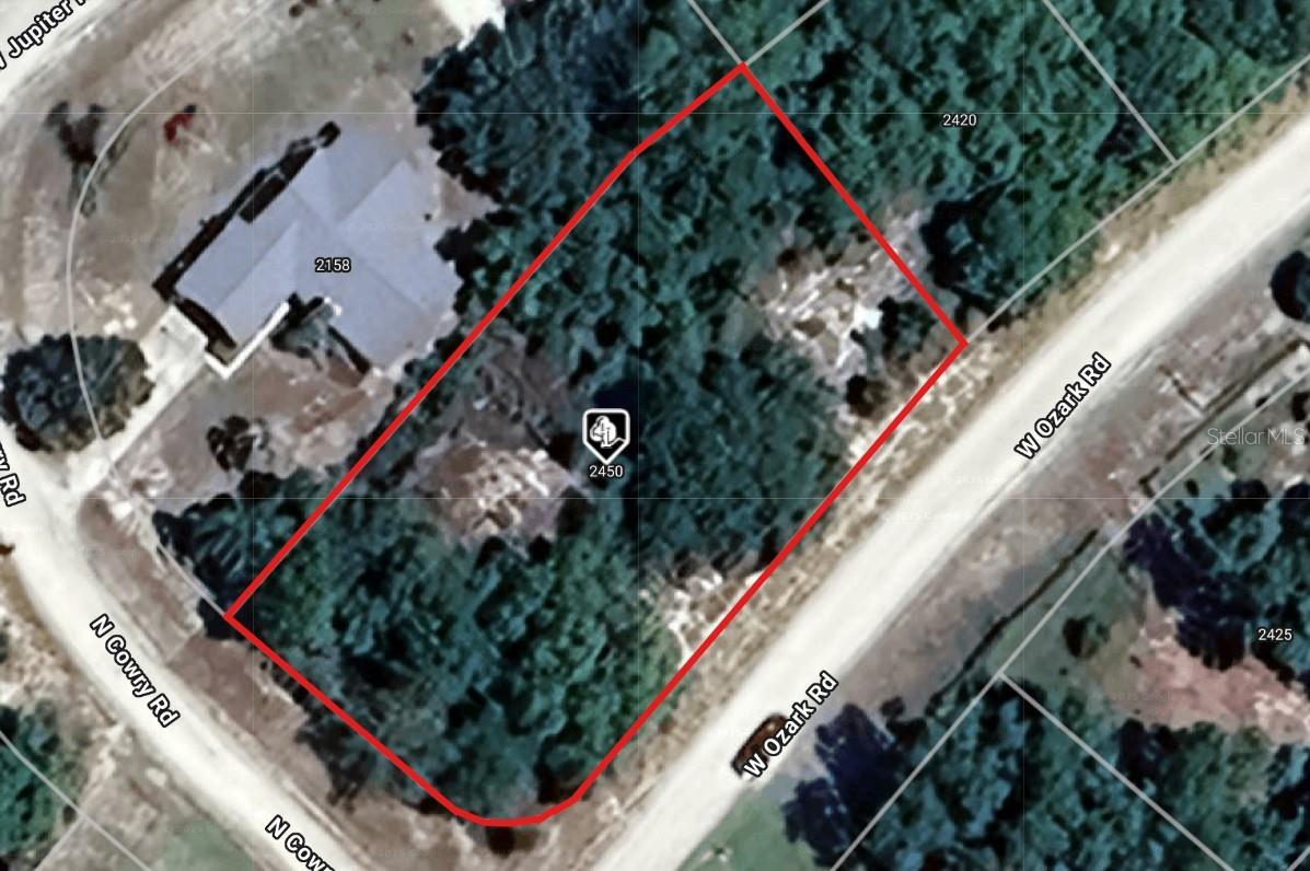 Owner Financing Available. This rare gem vacant lot is a half acre is an oversized corner lot is priced to sell fast. Most lots within this neighborhood are .18 with a few that are double lots. Located out of the flood plain, this lot is within 3 miles of more than a dozen different lakes. Publix and Walmart are both a little less than ten miles. Call NOW!