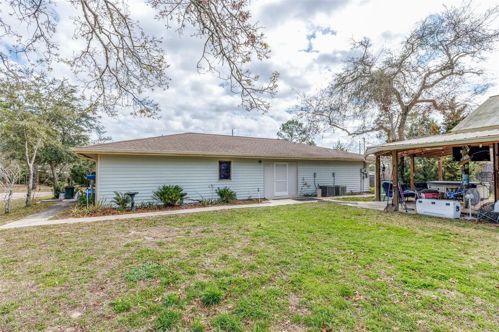 Photo of 8279 Sunshine Grove Rd, Brooksville, FL 34613 (MLS # OM714040)