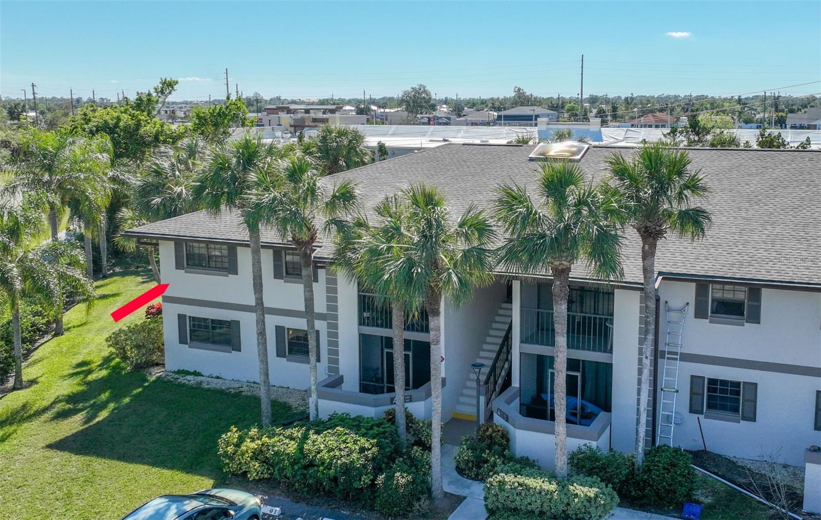 Partially furnished, charming 2-Bedroom, 2-Bathroom Condo in Prime Florida Location** Welcome to this beautifully maintained 2-bedroom, 2-bathroom condominium, offering a perfect blend of comfort and convenience. Located in a sought-after community, this home features luxury vinyl flooring throughout the spacious living areas, creating a sleek and modern feel. The kitchen and living spaces are bright and open, ideal for entertaining or relaxing. Step outside your living room to your private screened balcony, where you can enjoy the serene views of swaying palm trees while relaxing on the stylish slate flooring. The primary suite boasts ample closet space and natural light. The second bedroom including built in shelving and even more storage space with the closet running along one wall. Both bedrooms offer quiet serenity. The bathrooms are complete with tubs, providing a relaxing retreat after a long day. The community amenities include a sparkling pool, perfect for warm Florida days, shuffleboard, grills and additional facilities that gives convenience and enjoyment. Best of all, this condo is just moments away from shopping, dining, and medical facilities, making it an ideal location for those seeking both comfort and accessibility. This is a gated 55+ community that does not allow pets. From the namesake towering oaks to the winding roads, everything about this community is designed to provide peaceful living. Don't miss the opportunity to own this well-maintained gem—schedule your showing today!