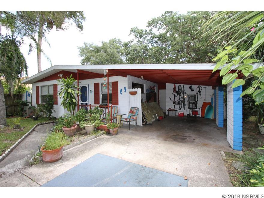 Beachside Charmer located within walking distance to Flagler Ave.  Terrazzo Floors, LARGE lot with gorgeous Oak Trees.  Bring your imagination and transform this home into your new oasis living the NSB Lifestyle.  There is an office that can easily be converted to a 3rd bedroom or enlarge for a huge master.  1/2 bath off laundry room.  LOADS OF POTENTIAL ;Water: City