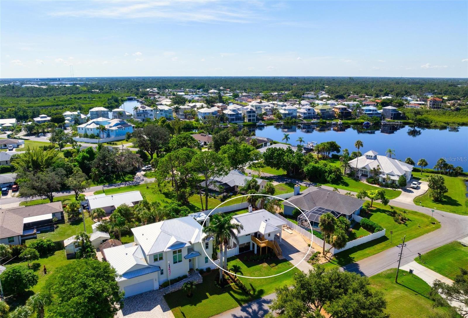 Welcome to your dream retreat in the coastal community of Hidden Bay Estates — a haven for boating, cycling, and beach enthusiasts alike. This thoroughly renovated home exudes a breezy Key West vibe and is filled with natural light that enhances its open floor plan and soaring vaulted ceilings. The stylish kitchen features white shaker cabinets, quartz countertops, and stainless steel appliances, while luxury vinyl and porcelain tile flooring throughout make for easy coastal living. Step outside to the brand-new expansive deck, accessible from the great room, primary suite, and guest bedroom — perfect for relaxing or entertaining in the Florida sunshine. A durable metal roof, ample parking, and storage space beneath the home, along with a large powered shed, offer both peace of mind and convenience. Just a half mile from the Legacy Trail and minutes from the neighborhood boat launch with direct access to Shakett Creek, Dona & Roberts Bays, and the Gulf, this location is ideal for water lovers. All of this, just a short 15-minute drive from beautiful beaches, downtown Venice, and a wide array of shopping and dining options.
